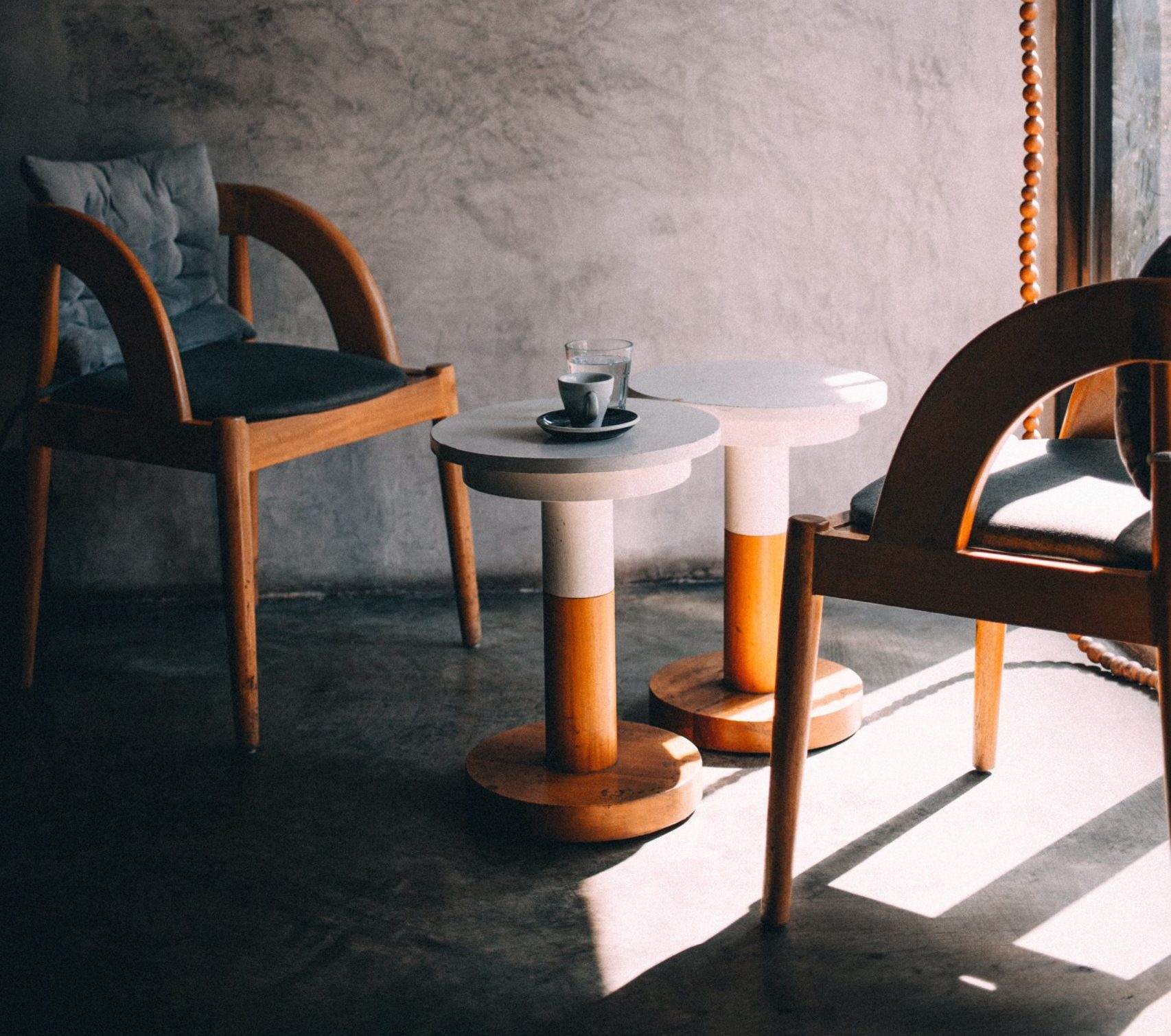 cropped-bare-stony-room-with-two-wooden-benches-and-coffee-tables-scaled-4.jpg